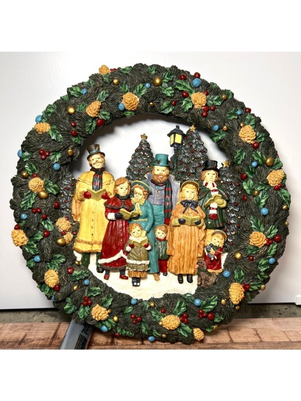 Christmas Carolers Wreath Wall Decor With Pinecones & Berries